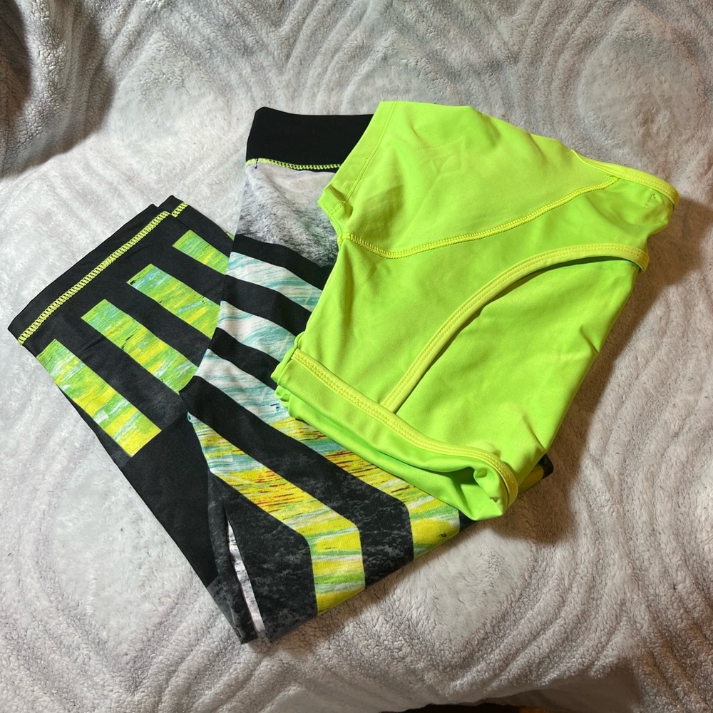 Athletic wear set open back shirt/Elastic capris pant barley worn. Sold as set